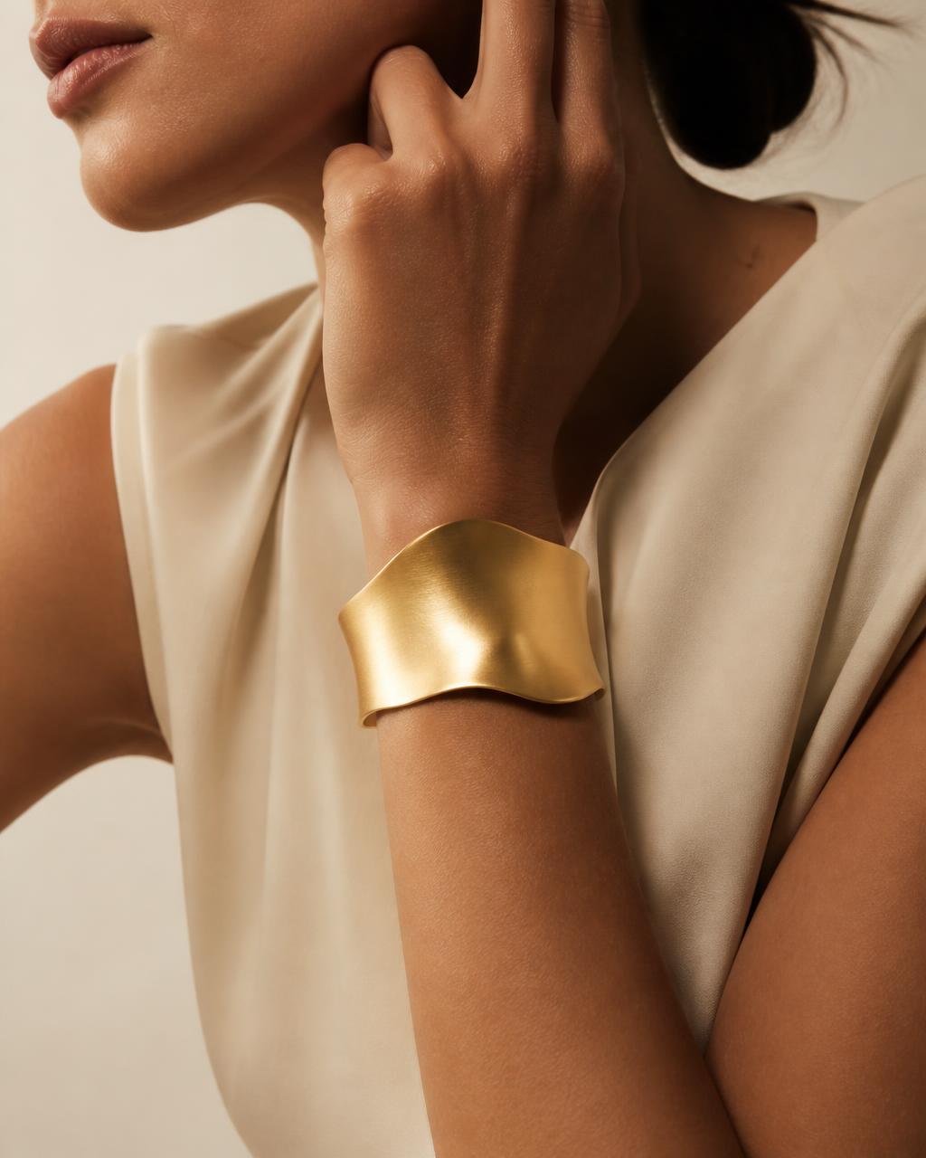 Sculptural Gold Cuffs
